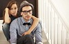Hipster couple sitting on the stairs