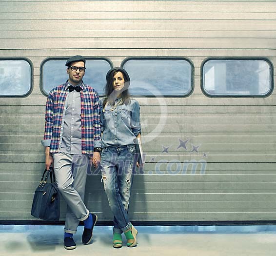 Couple standing by the lift up door