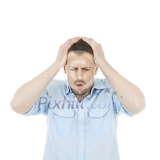 Isolated desperate man holding his head Isolated desperate man holding his head