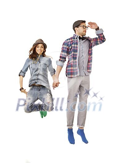 Hipster couple jumping in the air Hipster couple jumping in the air