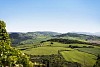 Sunny day on hilly landscape