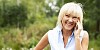 Woman smiling while on the phone