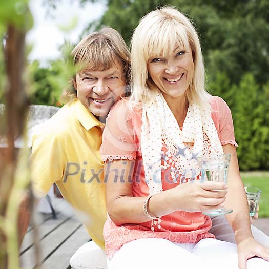 Older couple sitting outside Older couple sitting outside