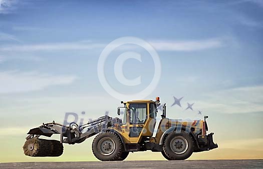Road sweeper machine on the road Road sweeper machine on the road