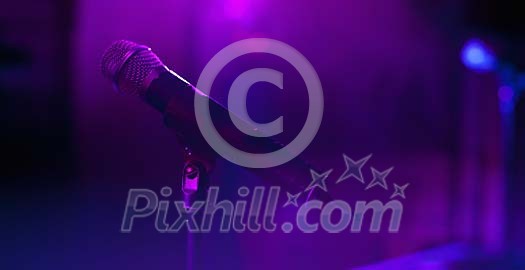 Microphone on a purple light Microphone on a purple light
