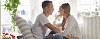 Couple sitting close on the sofa
