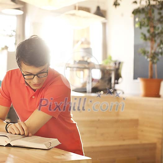 Man reading a book Man reading a book