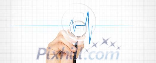 Hand holding a stetoscope on a heartbeat line Hand holding a stetoscope on a heartbeat line