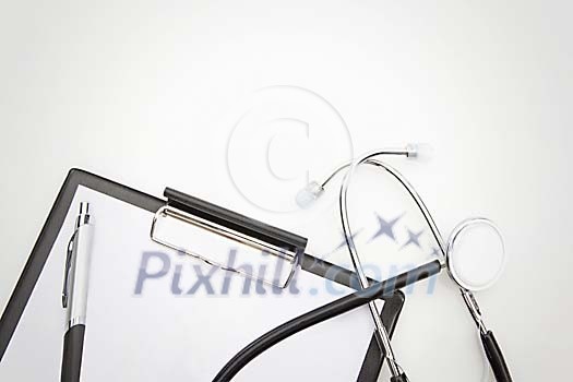 Stetoscope with a notepad Stetoscope with a notepad