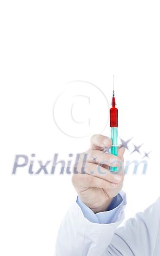 Hand holding a syringe filled with red fluid Hand holding a syringe filled with red fluid