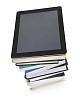 Isolated e-reader on a stack of books