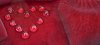 Waterdrops in Heartshape on Rose Petal