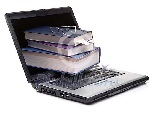 Traditional books coming through a laptop screen Traditional books coming through a laptop screen