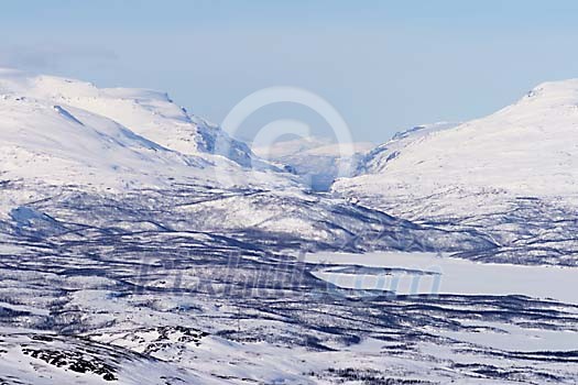 Mountains in Norway seen from Björkliden in Sweden. Mountains in Norway seen from Björkliden in Sweden.