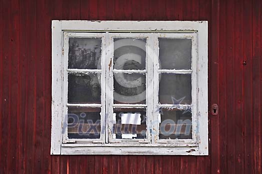 Old, rustic window with white frames Old, rustic window with white frames