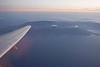 Plane wing over the island