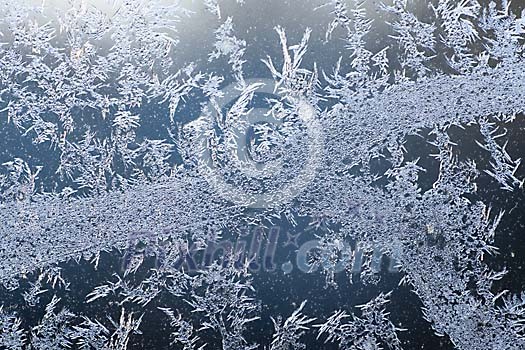 Ice crystals covering the glass Ice crystals covering the glass