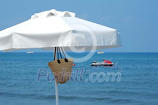 Parasol at watersport beach