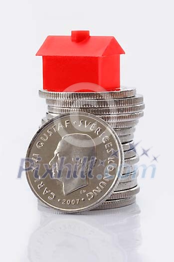 Red Monopoly house on swedish coins Red Monopoly house on swedish coins