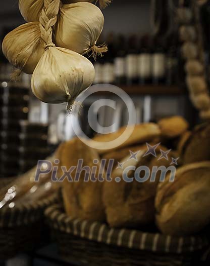 Garlic hanging in the bakery Garlic hanging in the bakery