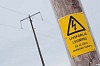 Power line warning sign