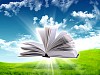 book in the air against green panoramic nature landscape