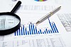 financial charts and graphs on the table