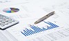 financial charts and graphs on the table