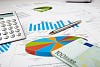 financial charts and graphs on the table