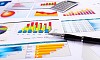 Graphs, charts, business table. The workplace of business people.