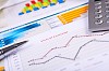 Graphs, charts, business table. The workplace of business people.