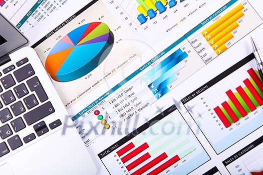 Graphs, charts, business table. The workplace of business people. Graphs, charts, business table. The workplace of business people.