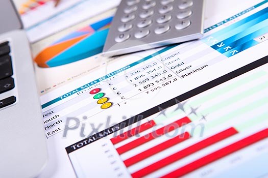 Graphs, charts, business table. The workplace of business people. Graphs, charts, business table. The workplace of business people.