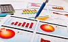 Graphs, charts, business table. The workplace of business people.