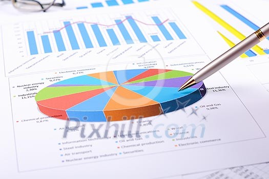 Charts and graphs of sales of securities - workplace successful business man Charts and graphs of sales of securities - workplace successful business man