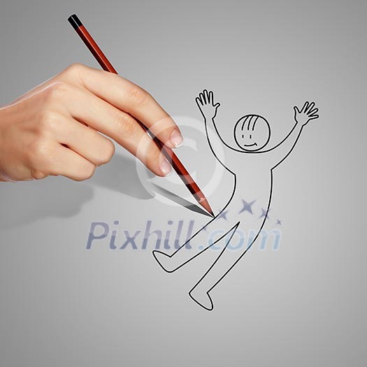 Human hand with a pencil drawing a man Human hand with a pencil drawing a man