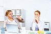 Young woman feeling unwell and sick in office