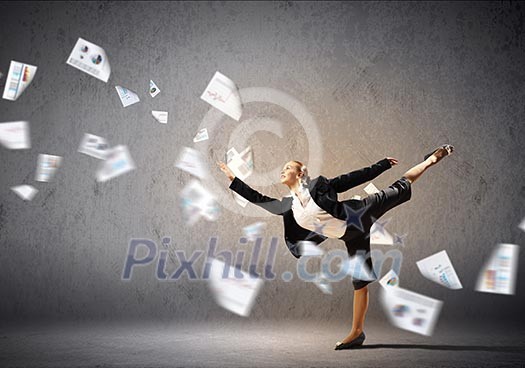 Image of pretty businesswoman jumping high against financial background Image of pretty businesswoman jumping high against financial background