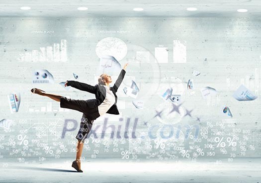 Image of pretty businesswoman jumping high against financial background Image of pretty businesswoman jumping high against financial background