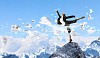 young businesswoman standing on one leg atop of mountain against diagram background