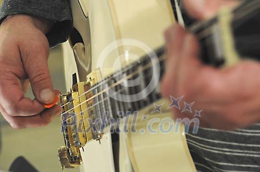 Closeup of a guitar palyer hands Closeup of a guitar palyer hands