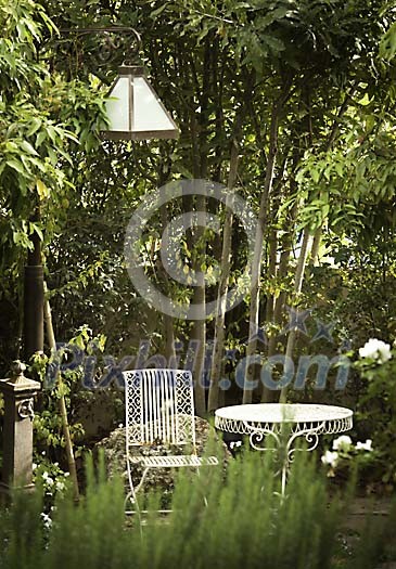 Table and a chair in the garden Table and a chair in the garden
