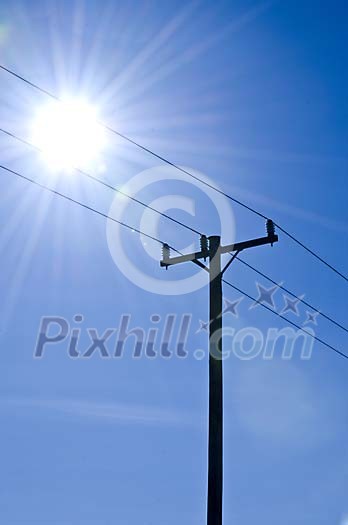 Sun shining over the electric power line Sun shining over the electric power line
