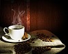 Steaming cup of coffee, cinnamon sticks and a few coffee beans. still life