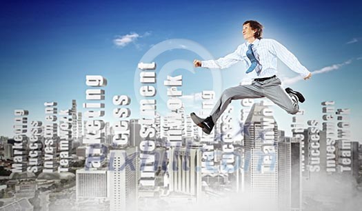 Image of a businessman jumping high against financial background Image of a businessman jumping high against financial background