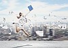 Image of a businesswoman jumping high against financial background