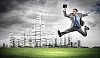 Young businessman in suit running on the road