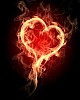 burning heart with flames against dark background