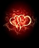 burning heart with flames against dark background