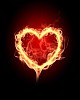 burning heart with flames against dark background
